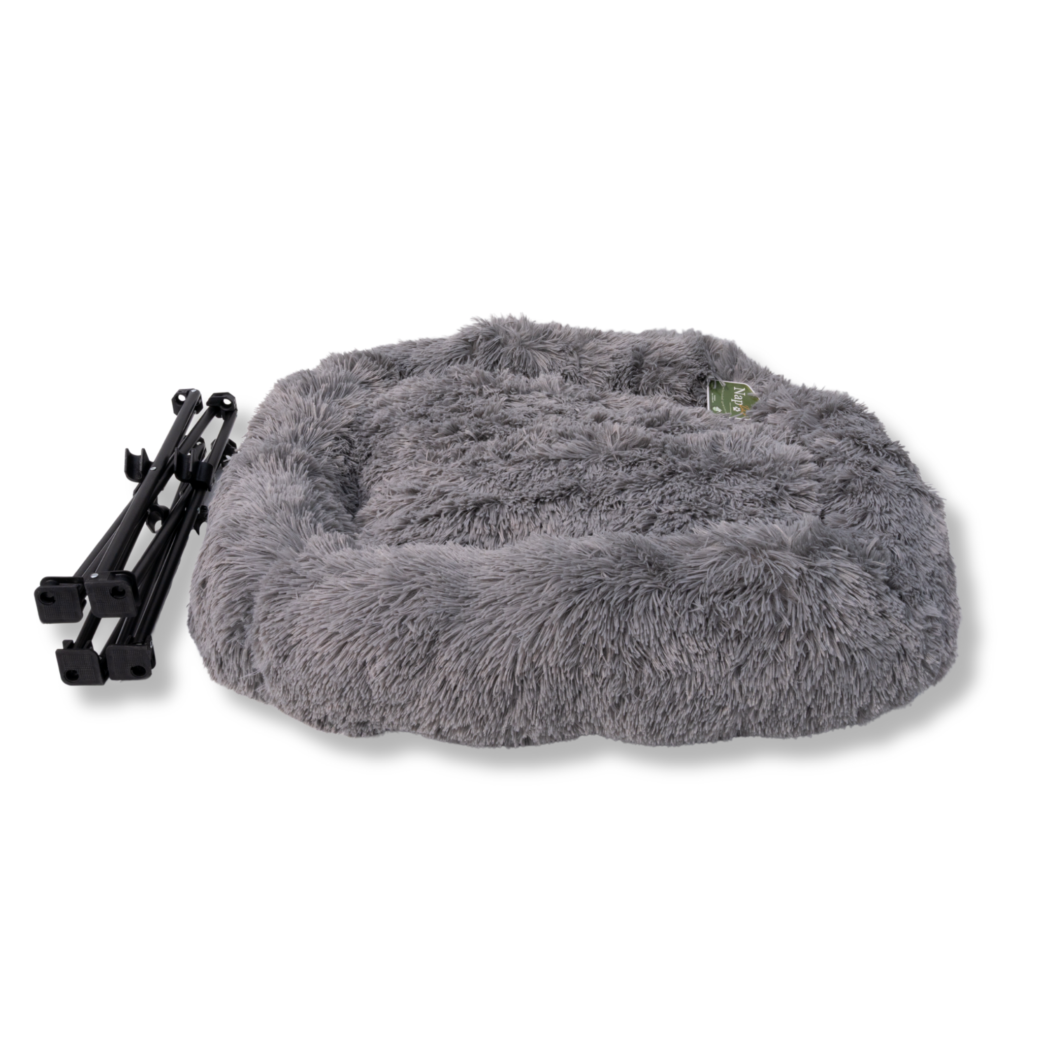 NapZZZ Fuzzle Ligstoel - Grijs, gedomonteerde stoel. Het onderstel ligt los naast het bed.