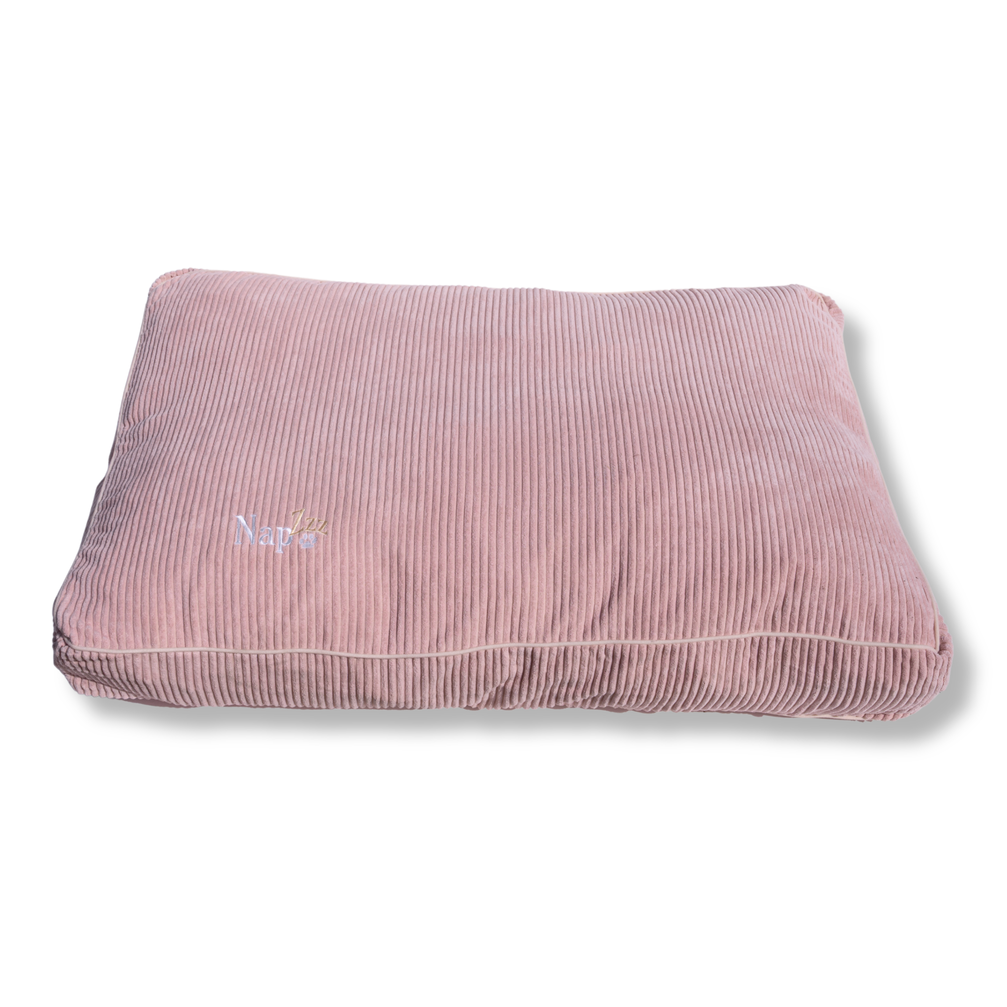 NapZZZ honden ligkussen, middel tot grote honden, afbeelding van de voorkant, rib fluwelen stof in de kleur roze. Hoes voorzien van ritssluiting. Zeer stevig gevuld met schuimrubberen vlok in aparte binnenhoes met rits. Mooi afgewerkt met biesrand en napzzz logo.