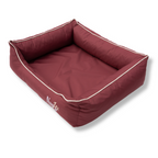 Napzzz hondenmand divan waterafstotend oxford in zijaanzicht op witte achtergrond. Luxe zeer stevig gevulde hondenmand. Gevuld met schuimvlok en schuimrubber ligmatras. Ligmatras uitneembaar en mand is geheel voorzien van ritssluiting. Mooi afgewerkt en in diverse maten en kleuren verkrijgbaar